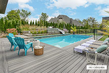 Patio with a pool by Patio Design inc.